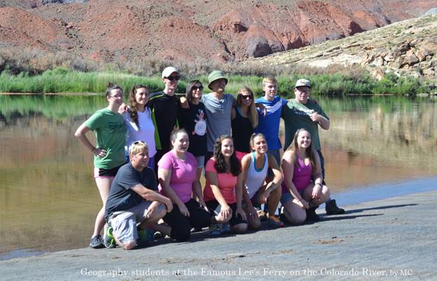 A group of people posing for a photo

Description automatically generated with medium confidence